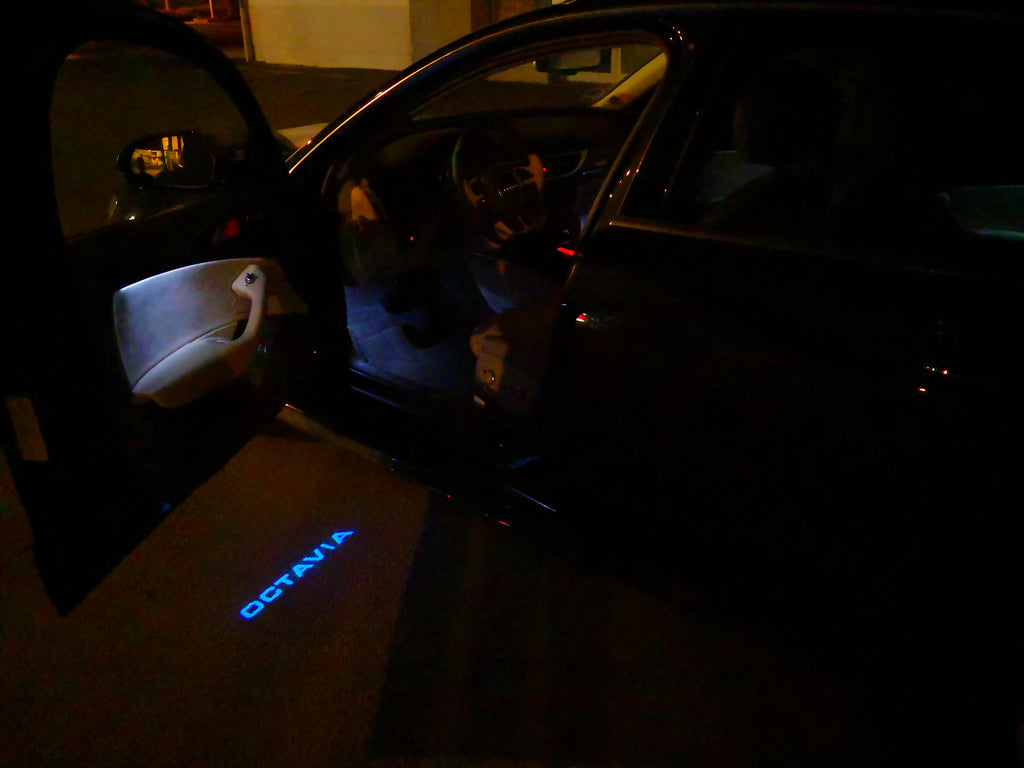 SKODA OCTAVIA LOGO PROJECTOT LIGHTS Nr.104 (quantity  1 =  2 Logo Film /  2 door lights)