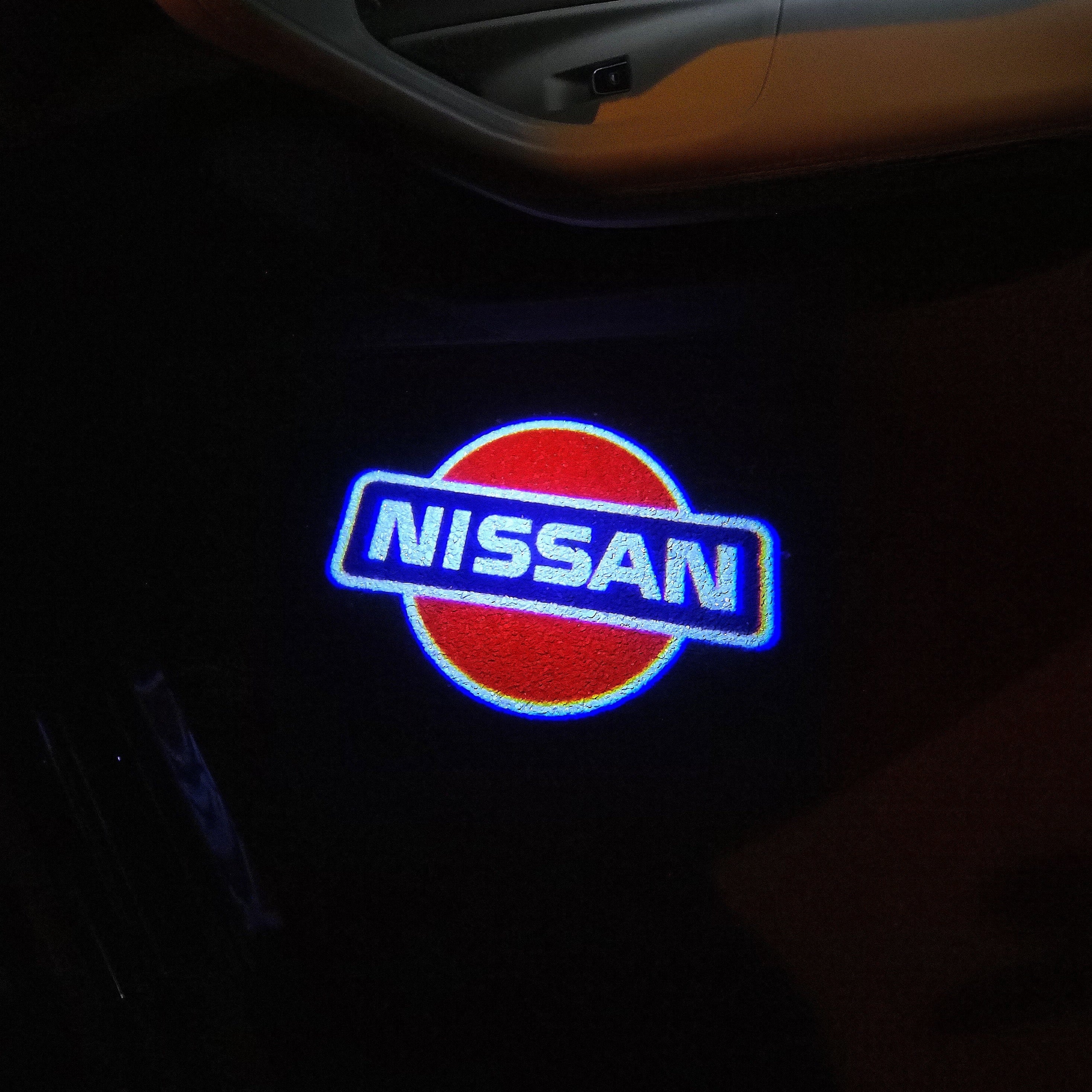 NISSAN PROJECTOT LIGHTS Nr.14(Menge 1 = 2 Logofolien /2 Türleuchten)