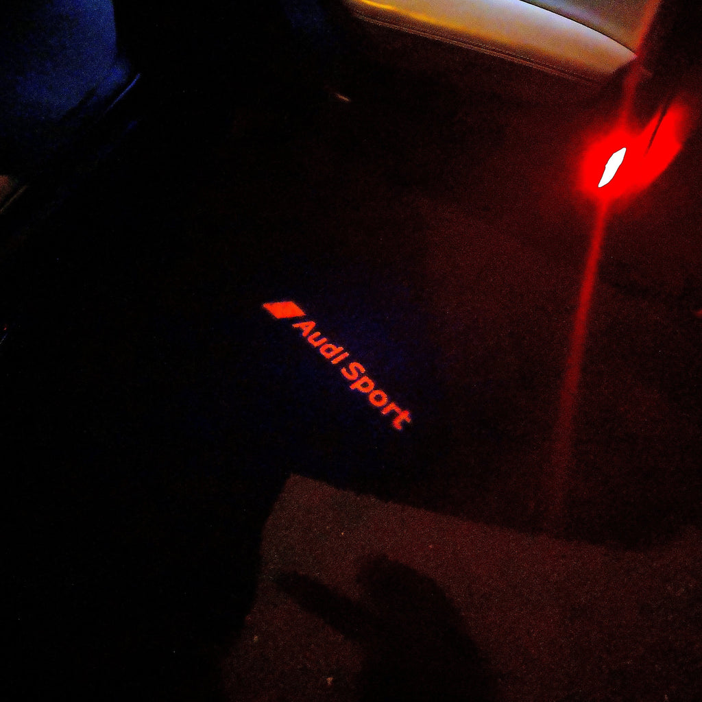 LUCES DE PROYECTOR LOGO AUDI No 111 (cantidad 1 = 2 películas con logotipo / 2 luces de puerta)