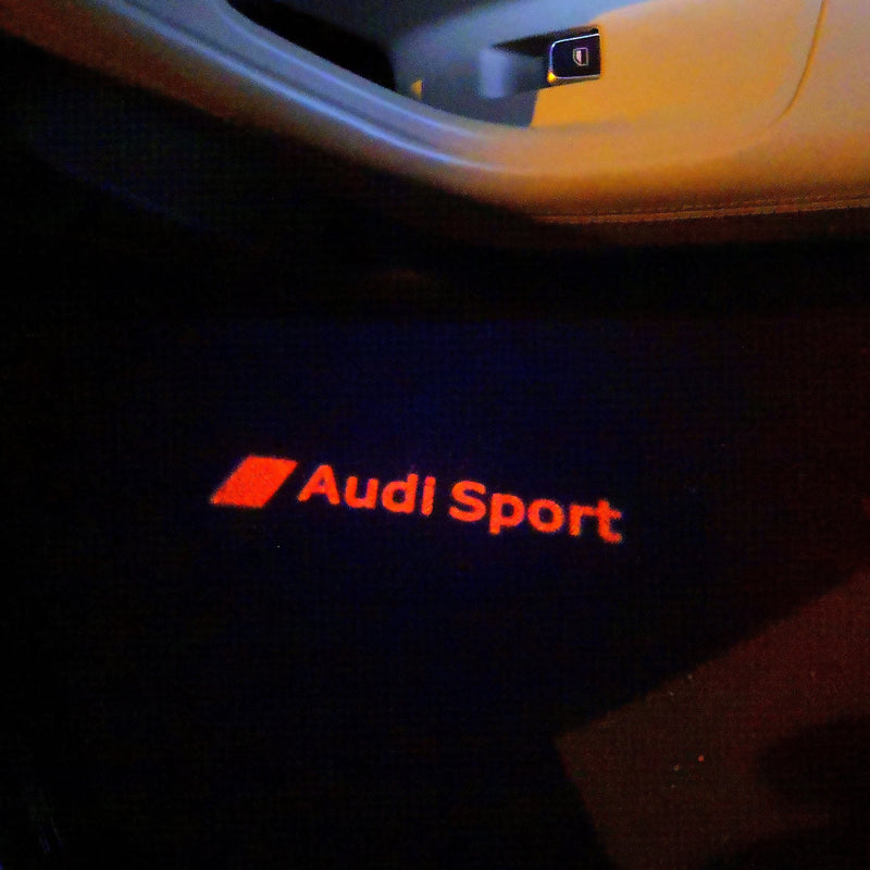 LUCES DE PROYECTOR LOGO AUDI No 111 (cantidad 1 = 2 películas con logotipo / 2 luces de puerta)