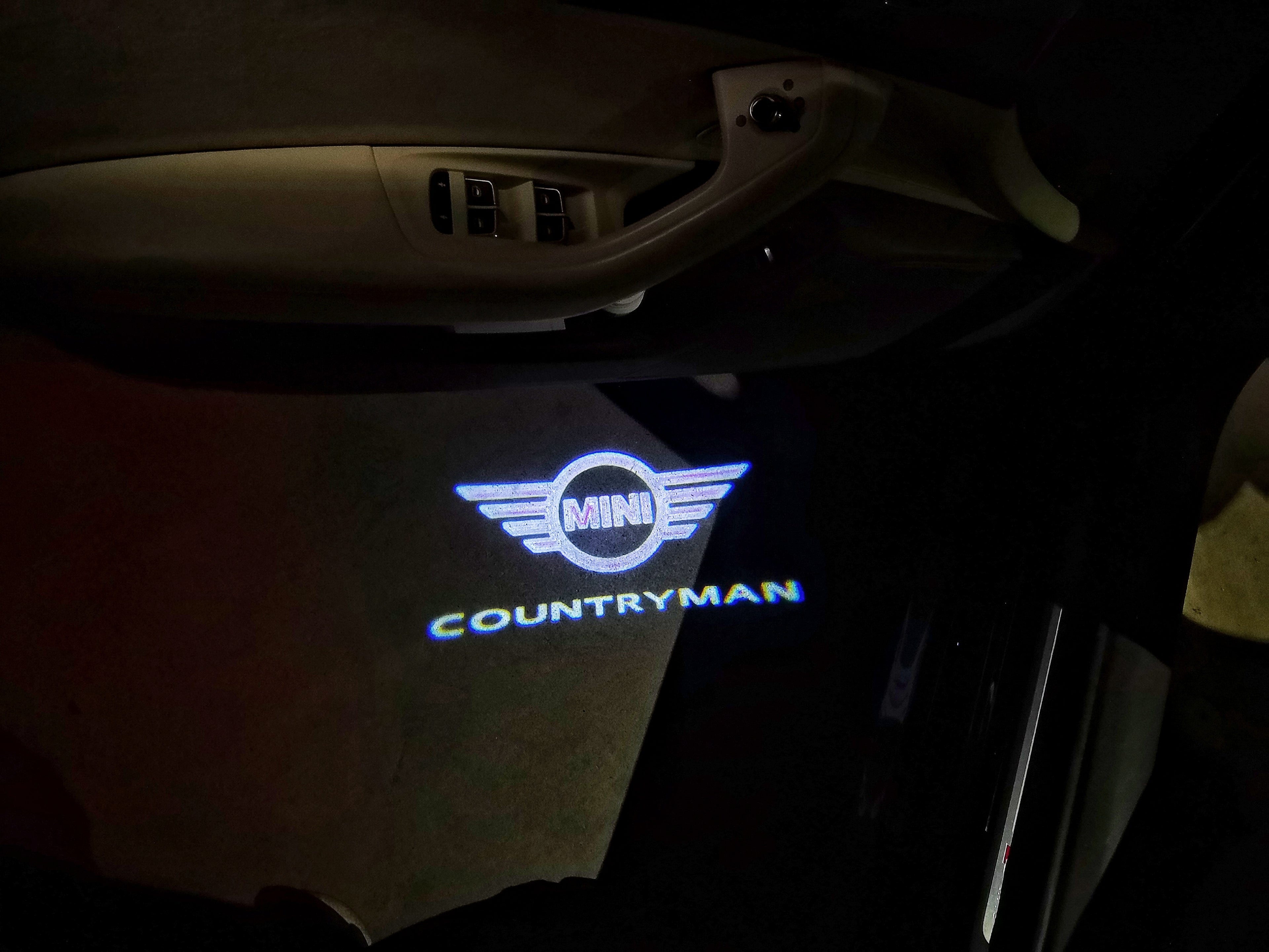 MINI COUNTRYMAN LOGO PROJECROTR LUCI Nr.141 (quantità 1 = 2 Logo Film / 2 porte luci)