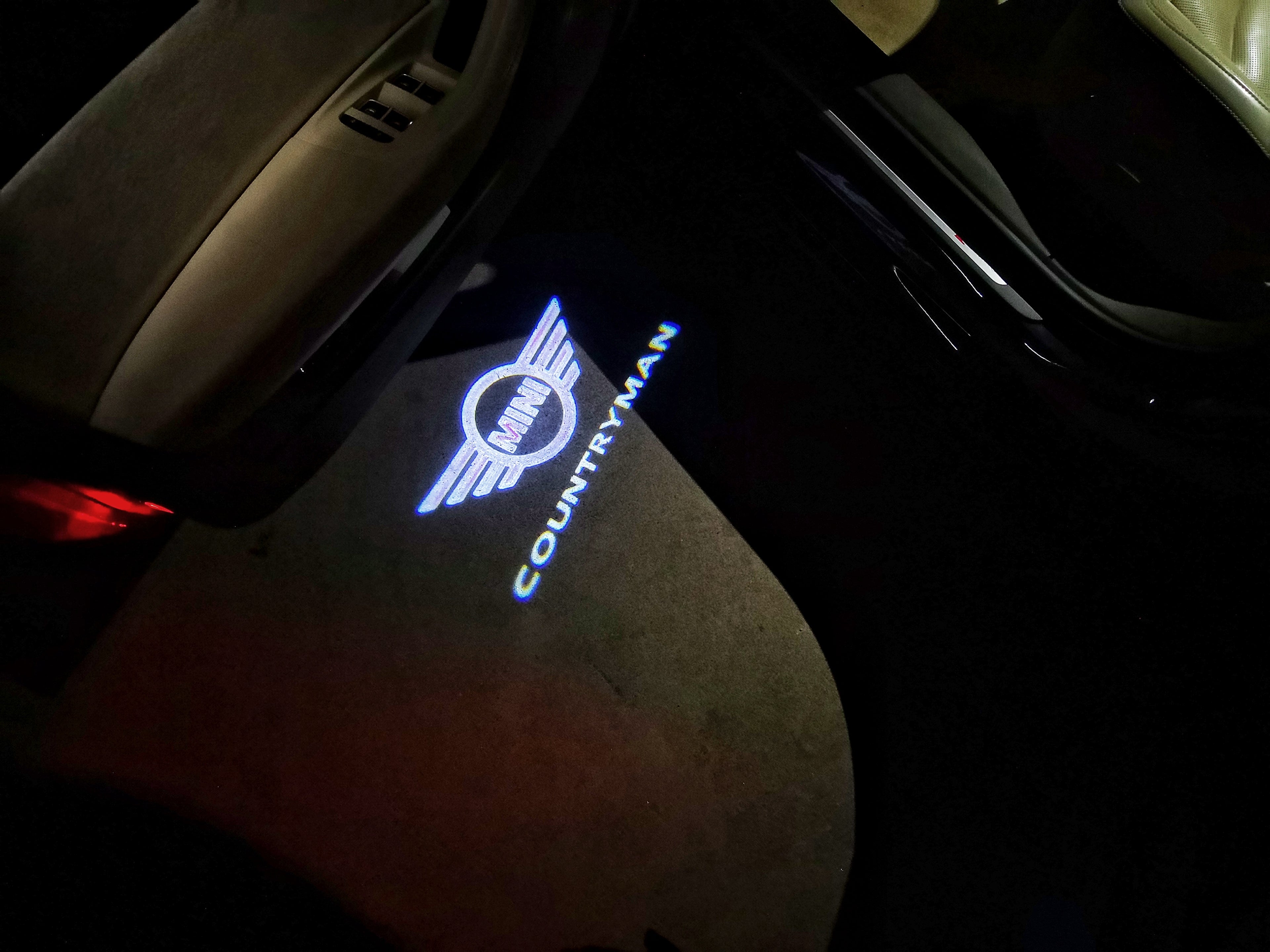 MINI COUNTRYMAN LOGO PROJECROTR LUCI Nr.141 (quantità 1 = 2 Logo Film / 2 porte luci)