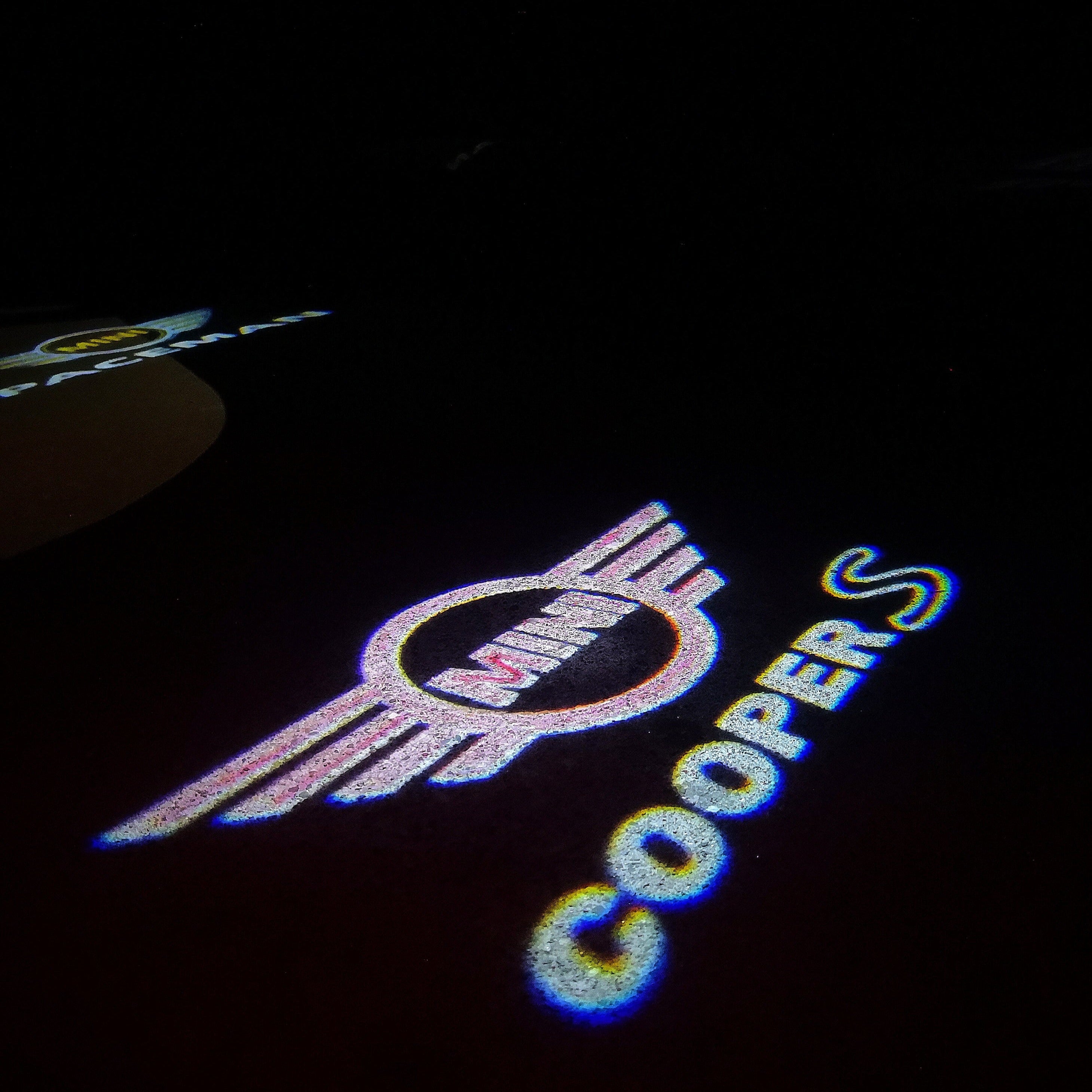 LUCI PROIETTORI LOGO MINI COOPER S Nr.144 (quantità 1 = 2 Logo Film / 2 luci porta)