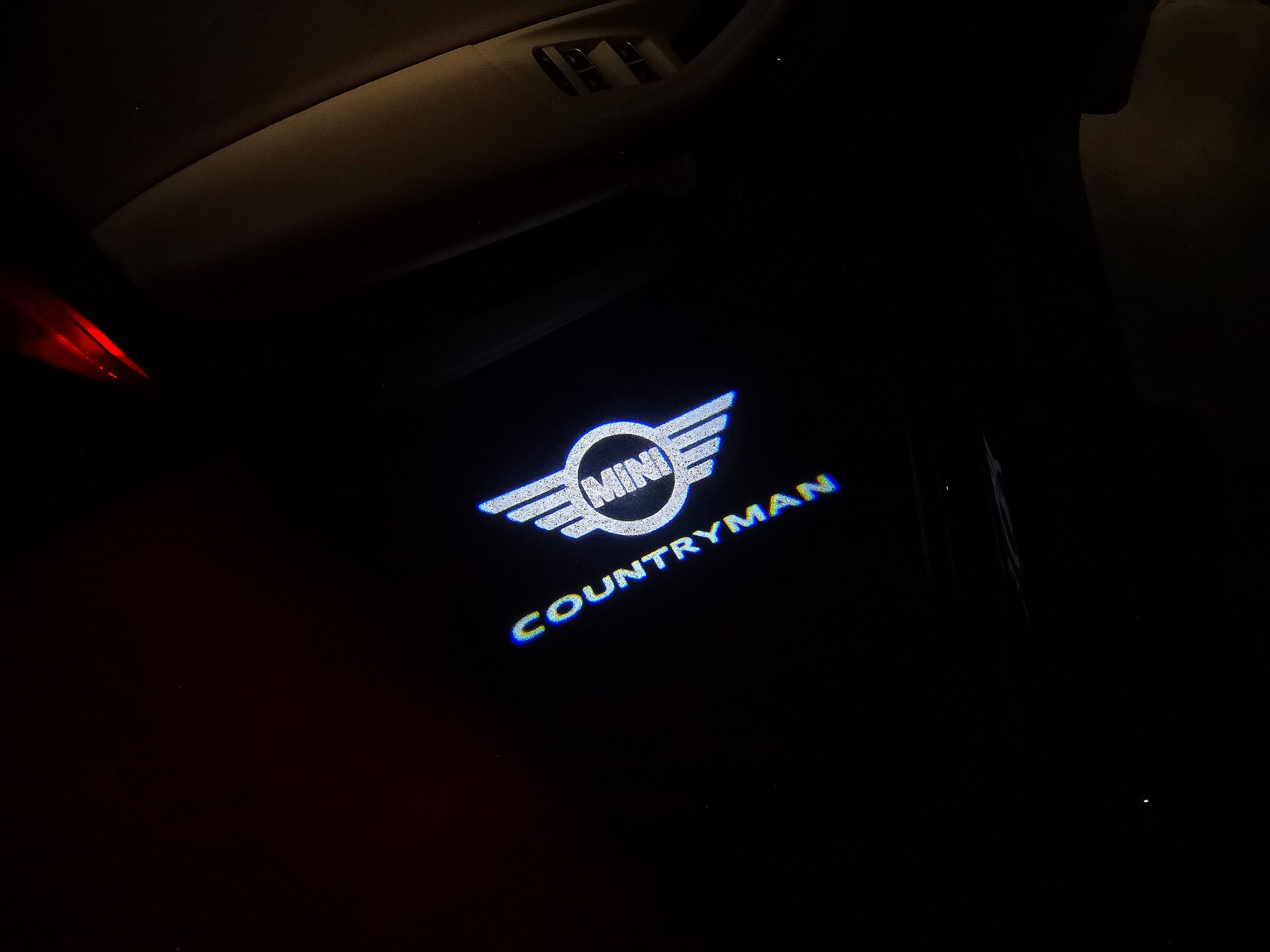 MINI COUNTRYMAN LOGO PROJECROTR LIGHTS Nr.128 (quantità 1 = 2 Logo Film / 2 luci porta)