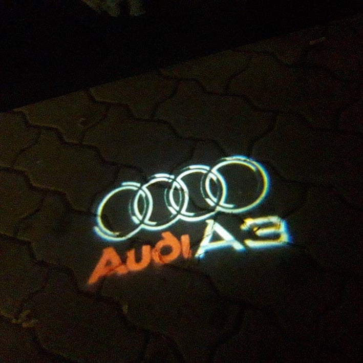 أضواء جهاز عرض شعار AUDI رقم 41 (الكمية 1 = 2 فيلم شعار / 2 مصباح باب)