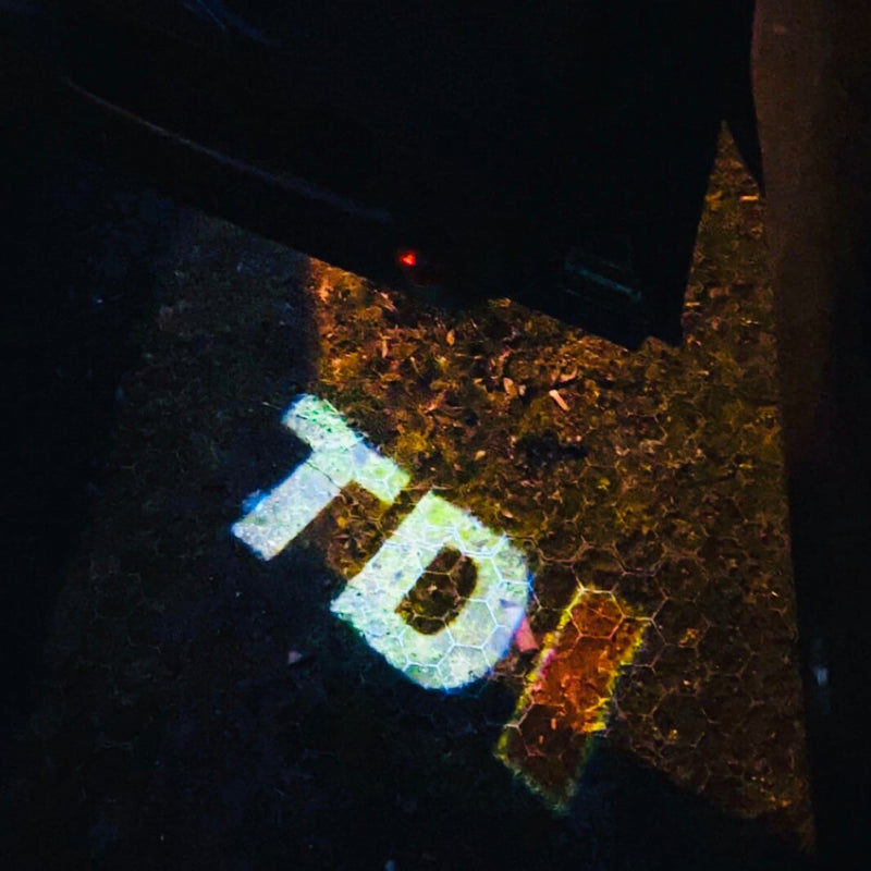 أضواء أبواب فولكس فاجن TDI Logo Nr. 56 (الكمية 1 = 2 فيلم شعار / 2 مصباح باب