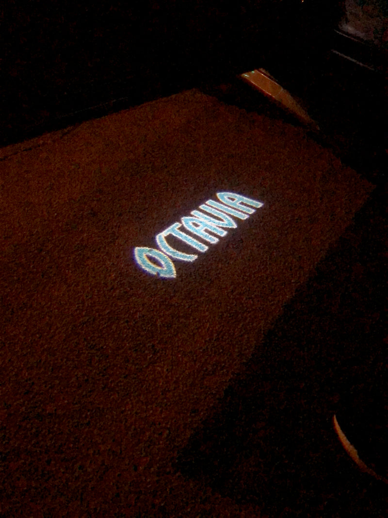 SKODA OCTAVIA LOGO PROJECTOT LIGHTS Nr.83  (quantity  1 =  2 Logo Film /  2 door lights)