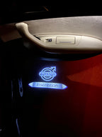 LUCI PROIETTORI LOGO Volvo Nr.69 (quantità 1 = 2 Logo Film / 2 luci porta)