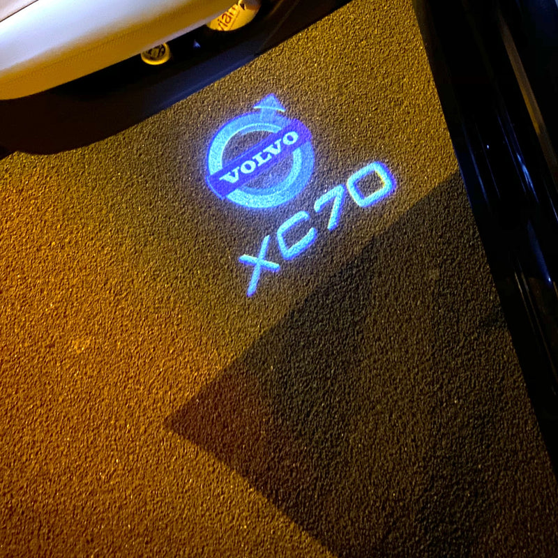 LUCES XC70 LOGO PROJECROTR Nr.18 (cantidad 1 = 2 Película con Logo / 2 luces de puerta)