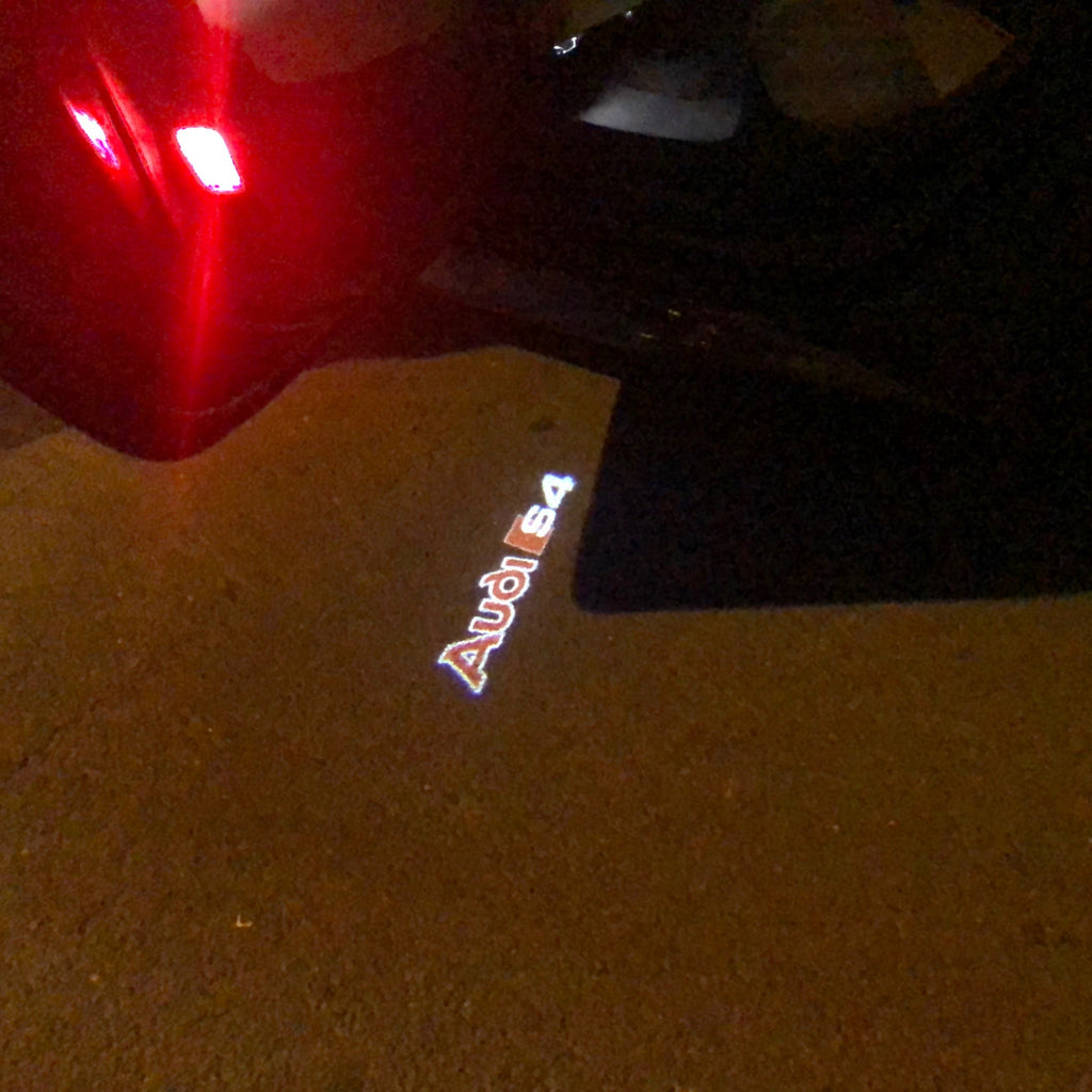 LUCI PROIETTORI LOGO AUDI Nr.88 (quantità 1 = 2 Pellicole Logo / 2 luci porta)