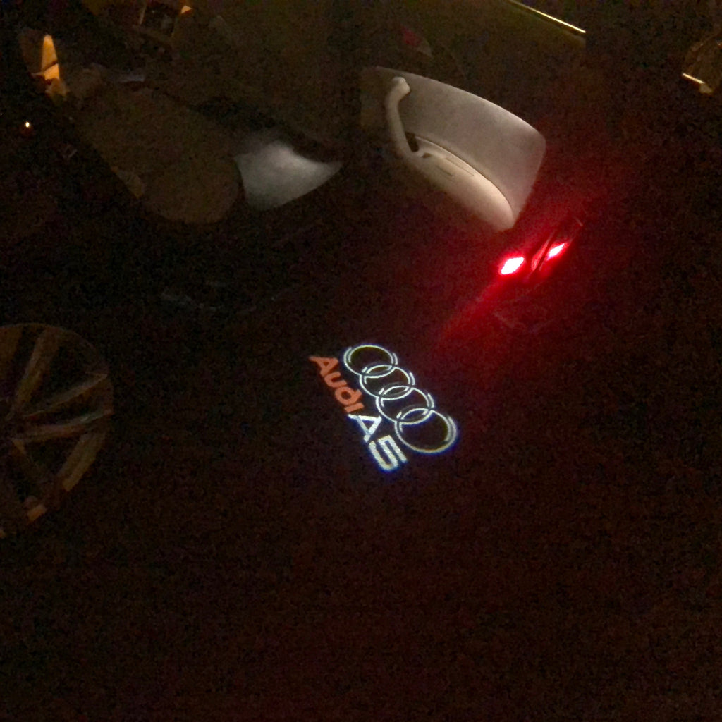 AUDI LOGO PROJECTOT LIGHTS Nr.43 (cantidad 1 = 2 películas con logotipo /2 luces de puerta)