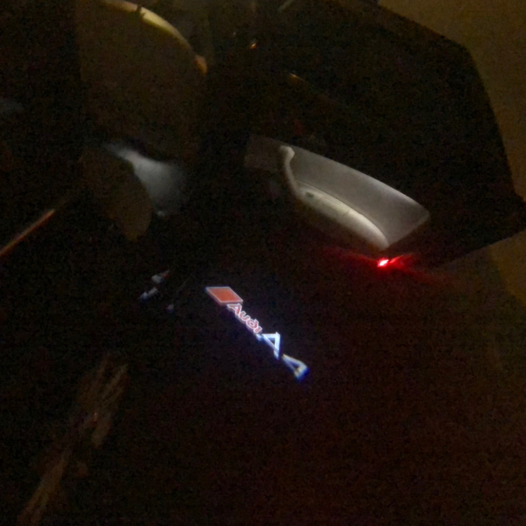AUDI LOGO PROJECTOT LIGHTS Nr.39 (Menge 1 = 2 Logofolien /2 Türleuchten)