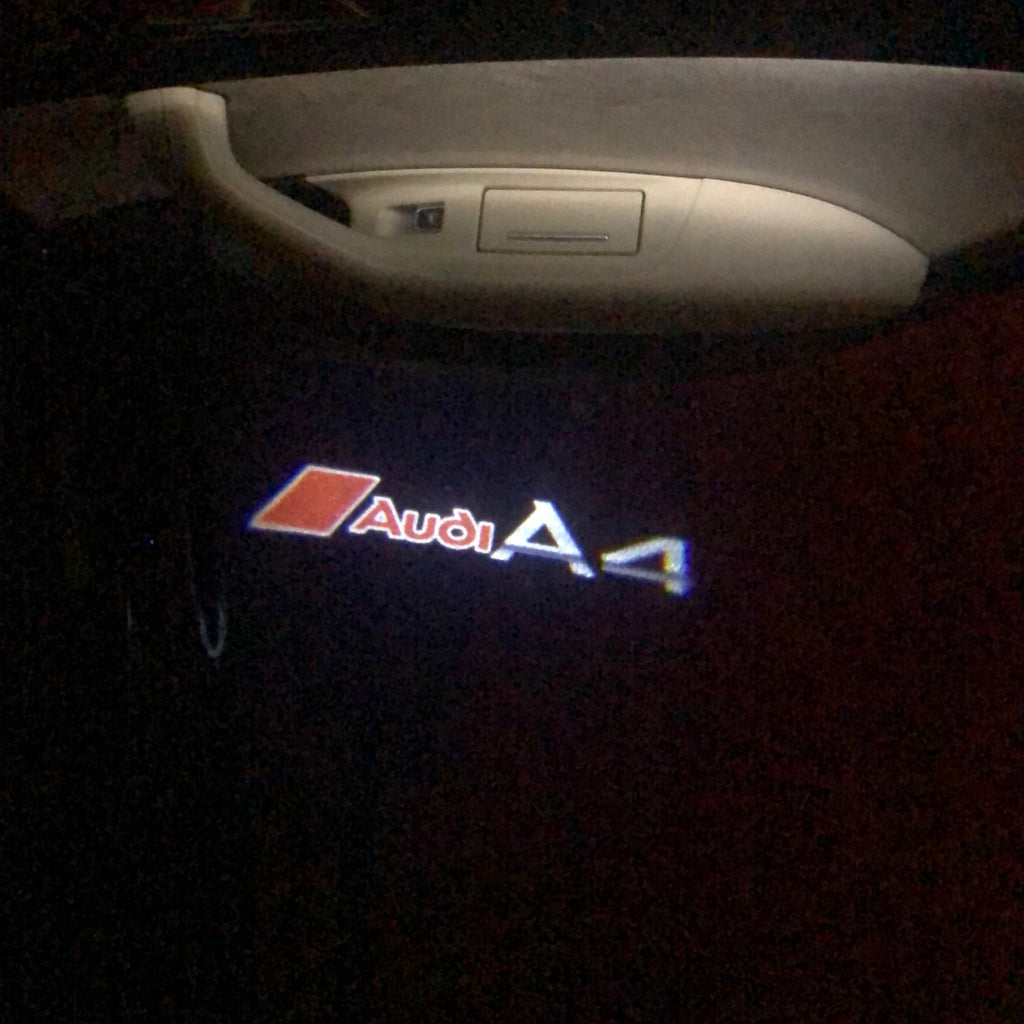 AUDI LOGO PROJECTOT LIGHTS Nr.39 (Menge 1 = 2 Logofolien /2 Türleuchten)