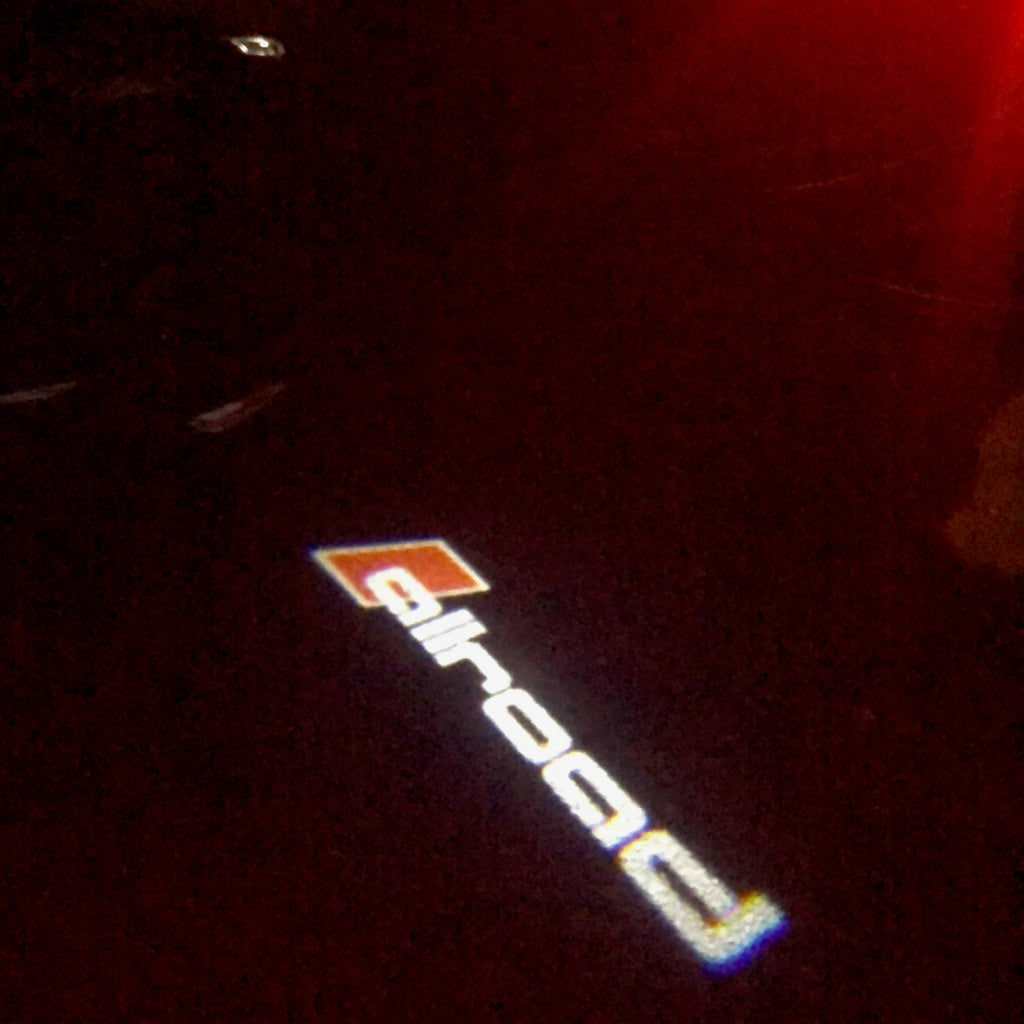 AUDI allroad LOGO PROJECTOT LIGHTS Nr.03 (quantità 1 = 2 Logo Films /2 luci porta)