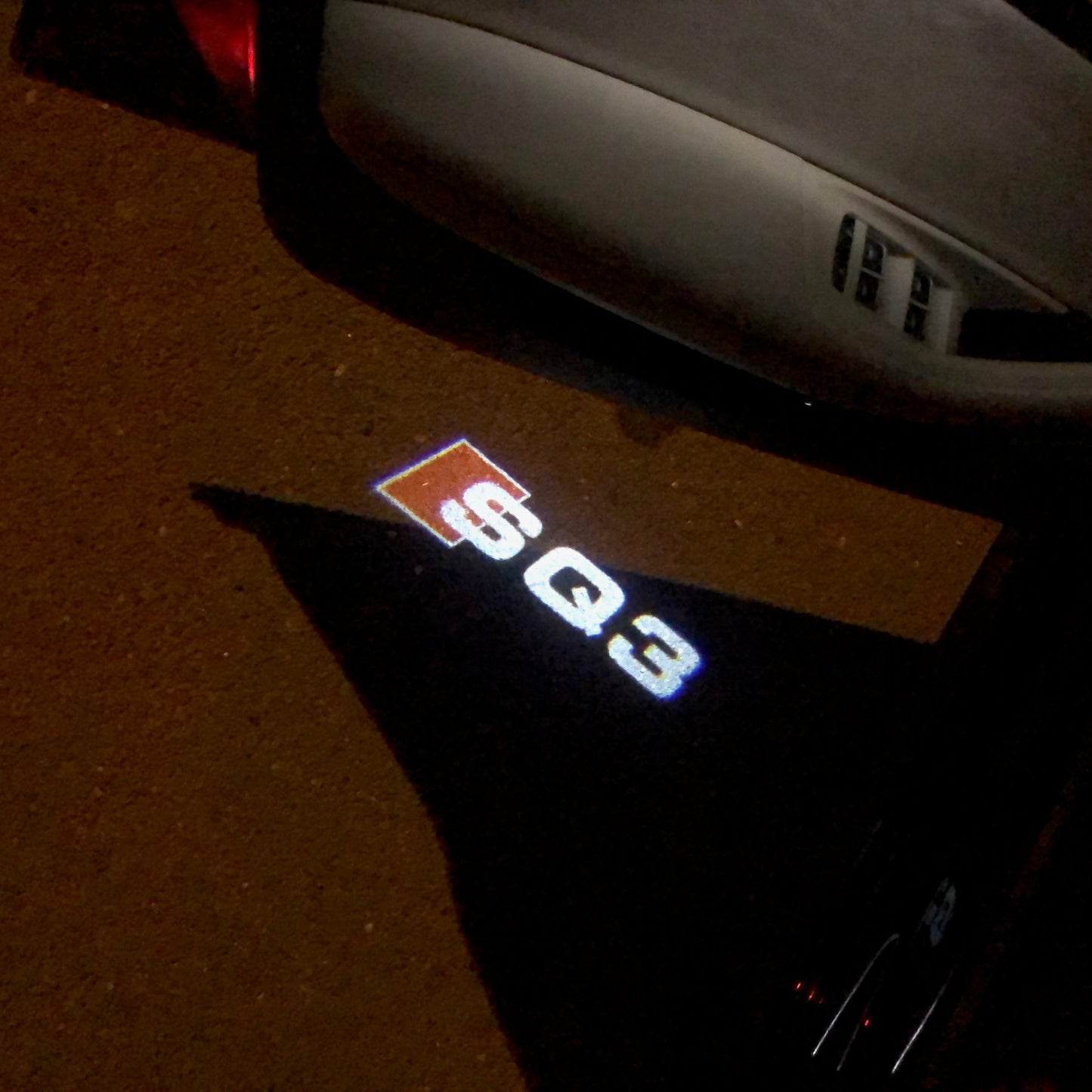 LUCES DE PROYECTOR LOGO AUDI Nr.57 (cantidad 1 = 2 películas con logotipo / 2 luces de puerta)