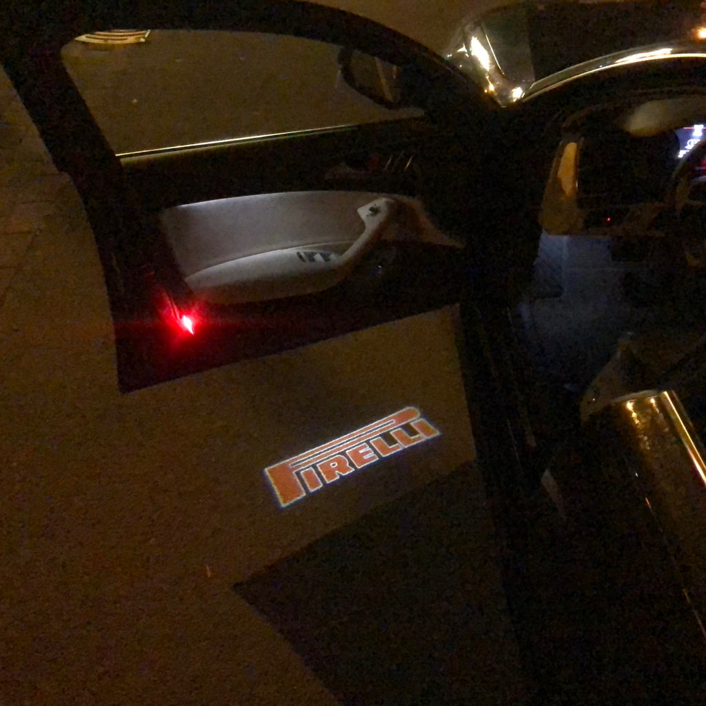 Volkswagen Porta luci PIRELLI Logo Nr. 27 (quantità 1 = 2 Logo Film /2 luci)