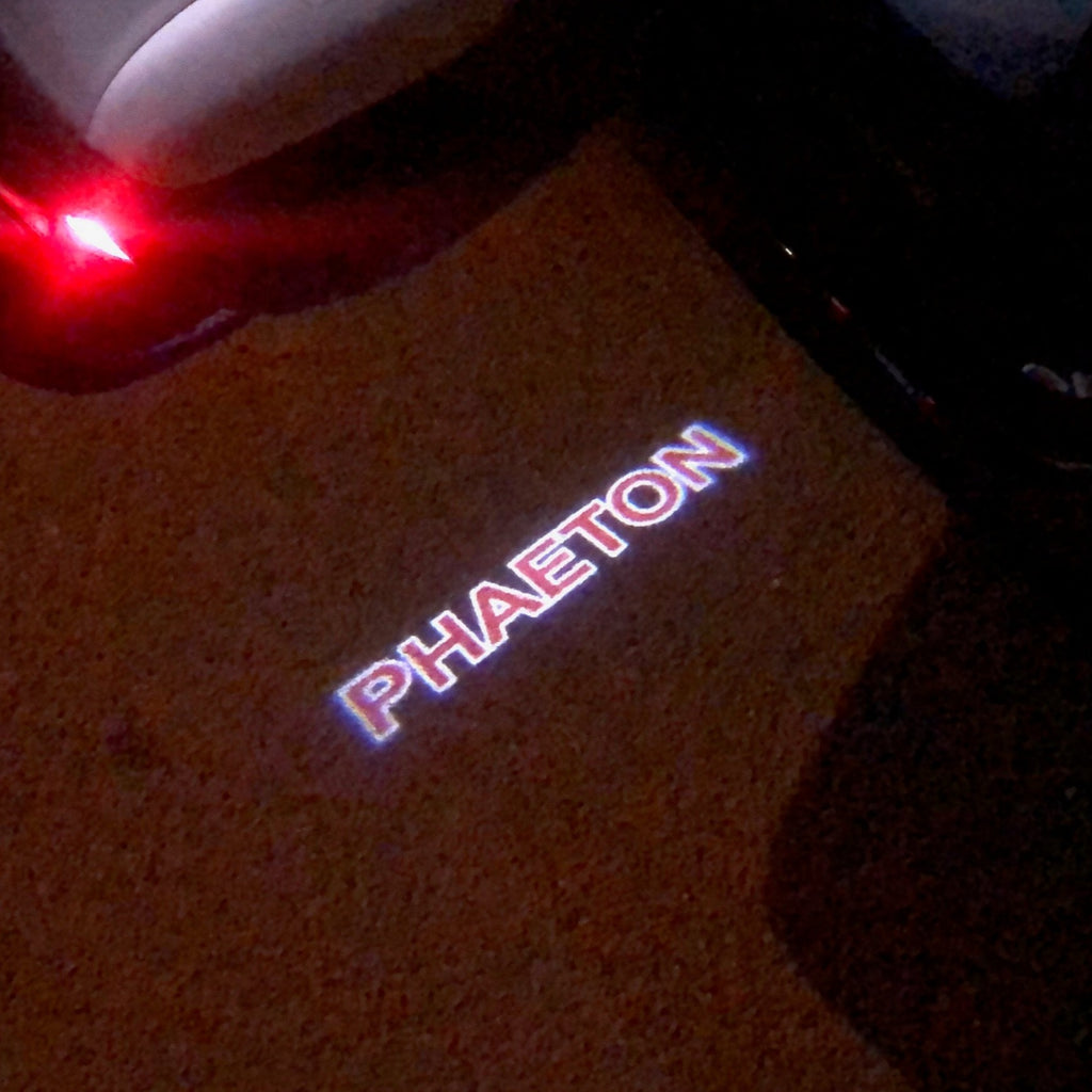 Volkswagen Porte luci PHAETON Logo n. 74 (quantità 1 = 2 Logo Films /2 da luci)