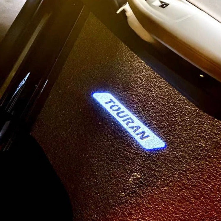 Volkswagen Door lights TOURAN Logo  Nr. 176 ( quantity 1 = 2 logo film / 2 door lights)