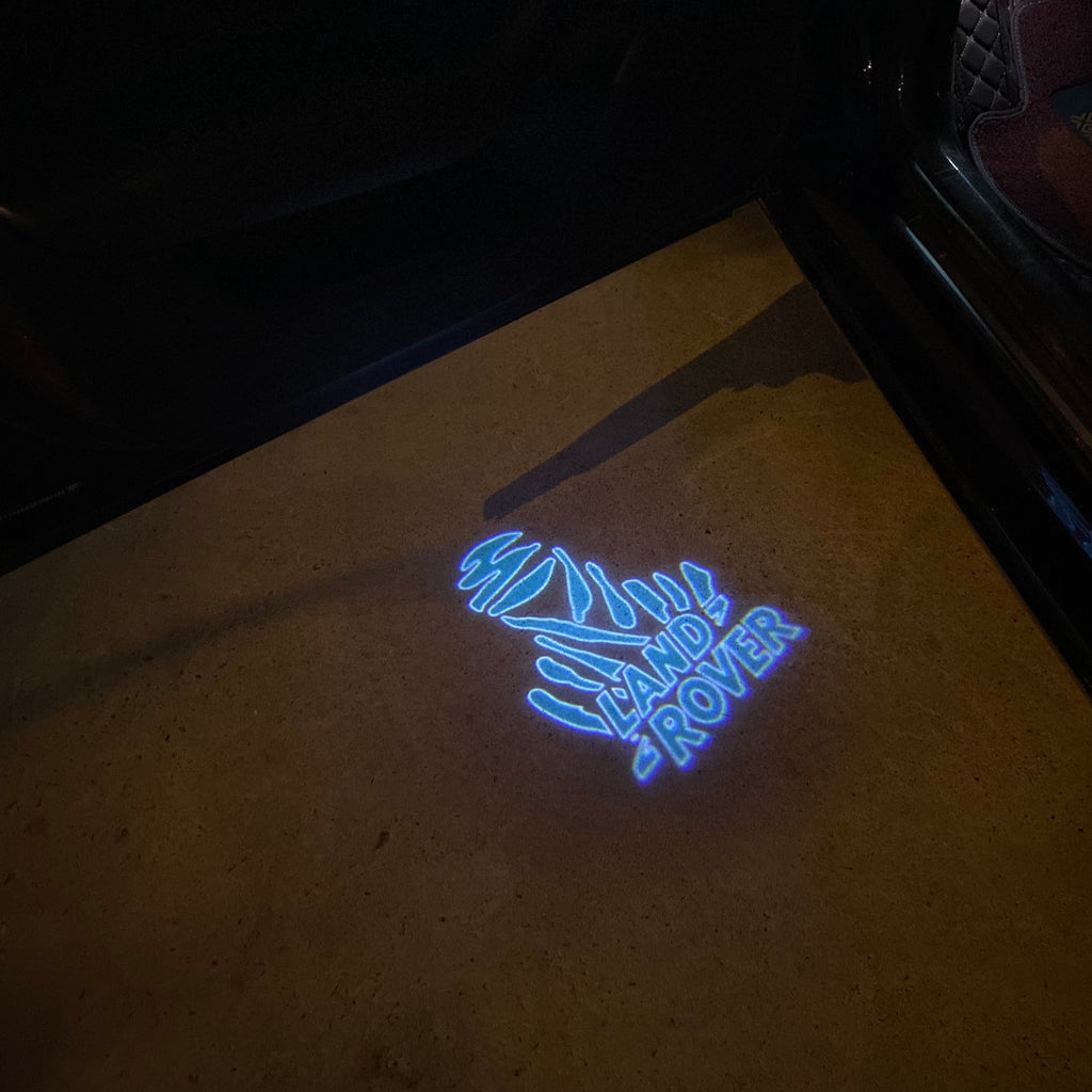 LUCES DE PROYECTOR CON LOGO Land Rover Nr.04 (cantidad 1 = 1 juegos / 2 luces de puerta)