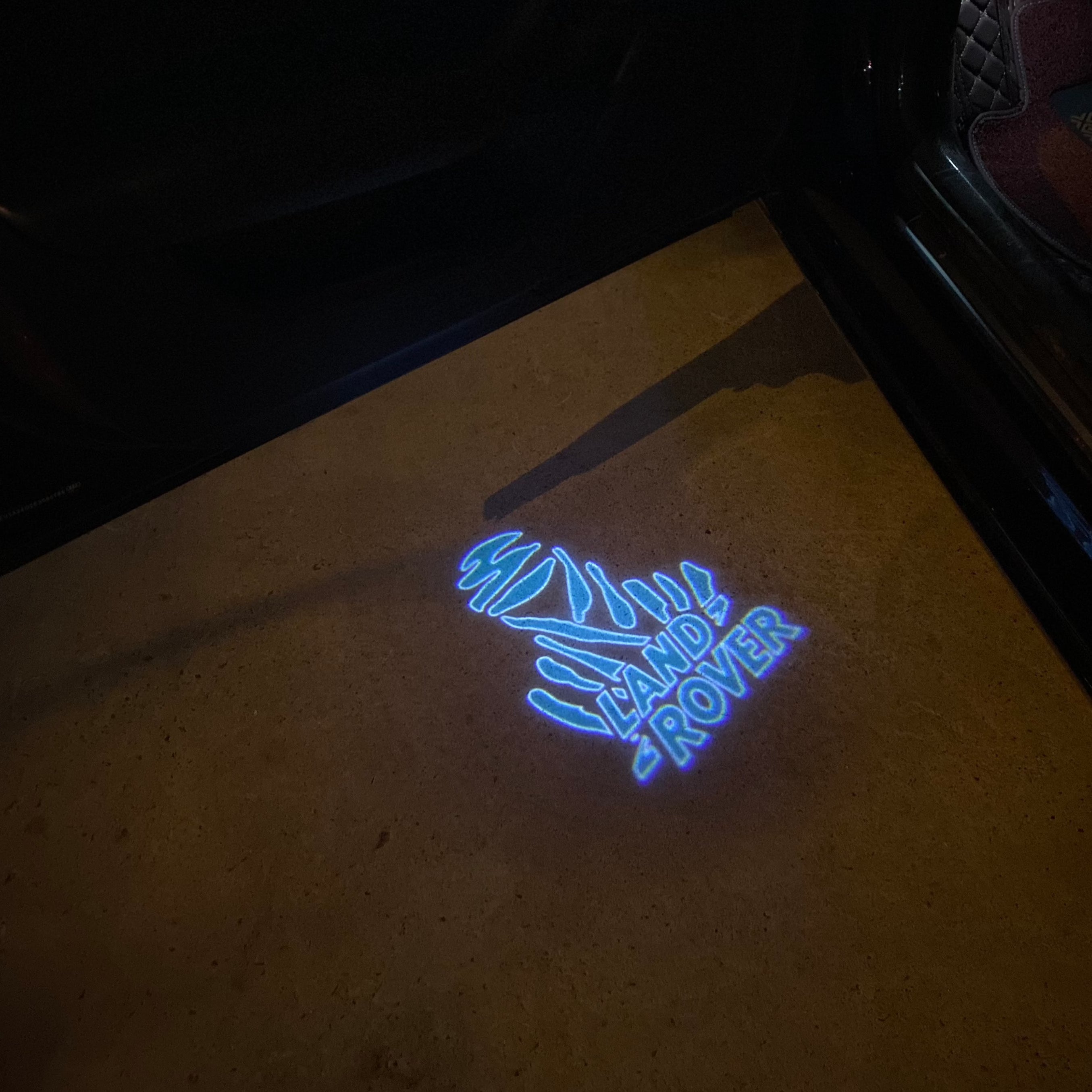 LUCES DE PROYECTOR CON LOGO Land Rover Nr.04 (cantidad 1 = 1 juegos / 2 luces de puerta)