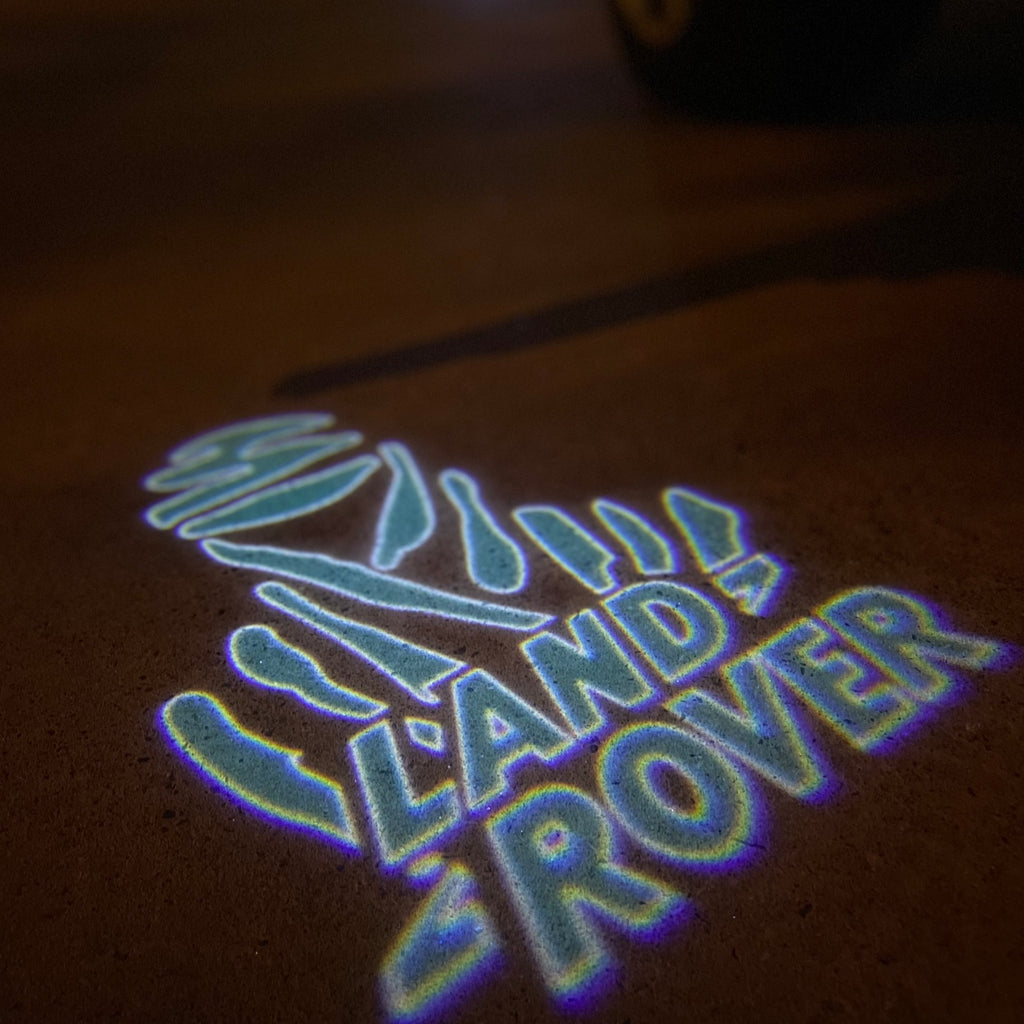 LUCES DE PROYECTOR CON LOGO Land Rover Nr.04 (cantidad 1 = 1 juegos / 2 luces de puerta)