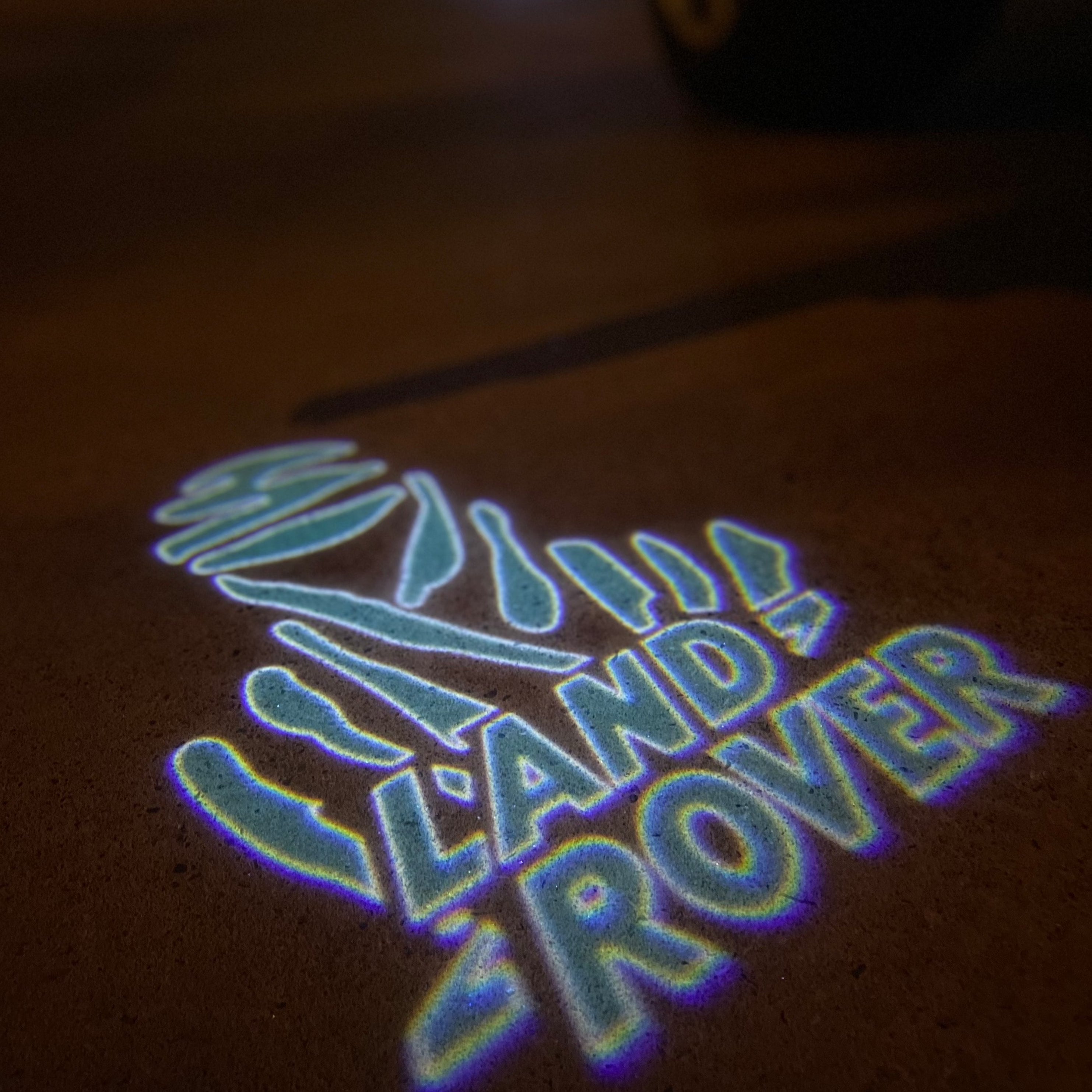 LUCES DE PROYECTOR CON LOGO Land Rover Nr.04 (cantidad 1 = 1 juegos / 2 luces de puerta)